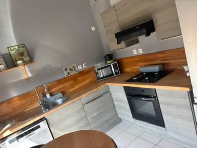 Cuisine ou kitchenette dans l'établissement Gîte des vaux