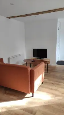 Télévision ou salle de divertissement dans l'établissement Gite neuf proche de la mer