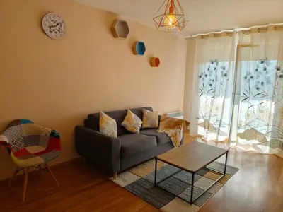 Coin salon dans l'établissement Chambre privée avec balcon de 3,5 m2 chez particulier