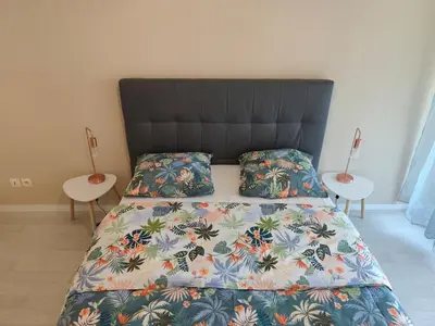 Un ou plusieurs lits dans un hébergement de l'établissement Chambre privée avec balcon de 3,5 m2 chez particulier