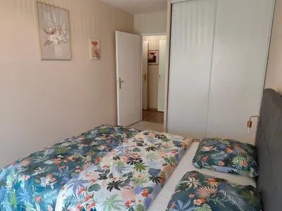 Un ou plusieurs lits dans un hébergement de l'établissement Chambre privée avec balcon de 3,5 m2 chez particulier
