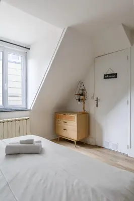 Un ou plusieurs lits dans un hébergement de l'établissement Cabane Cosy près de la fac - calme et confort
