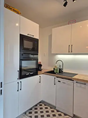 Cuisine ou kitchenette dans l'établissement Appartement Le Sea's Home Centre Historique