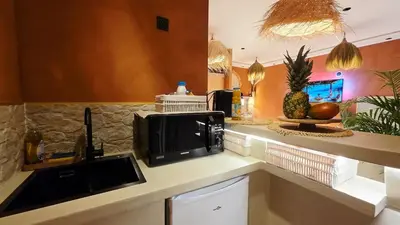 Cuisine ou kitchenette dans l'établissement Escape Zen - Suite and Spa