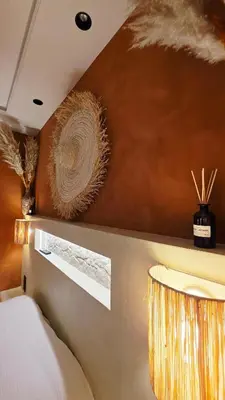 Un ou plusieurs lits dans un hébergement de l'établissement Escape Zen - Suite and Spa