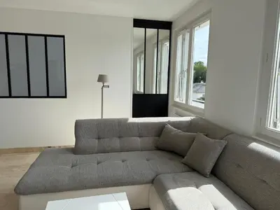 Coin salon dans l'établissement Le Prestige - Spacieux T3 Neuf et Lumineux