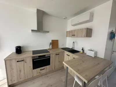Cuisine ou kitchenette dans l'établissement L 'Évasion Marine