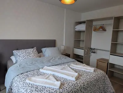 Un ou plusieurs lits dans un hébergement de l'établissement Charmant T2 centre-ville Amiens