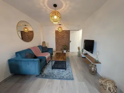Télévision ou salle de divertissement dans l'établissement Charmant T2 centre-ville Amiens