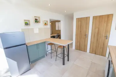 Cuisine ou kitchenette dans l'établissement Appartement de charme avec extérieur