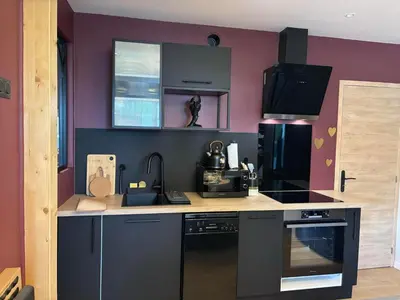Cuisine ou kitchenette dans l'établissement Suite Tentation Spa privatif & ambiance romantique