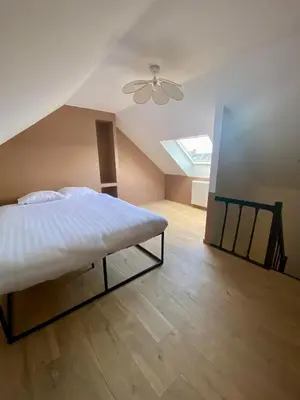 Un ou plusieurs lits dans un hébergement de l'établissement L'Amienoise Maison 2ch Confort et standing