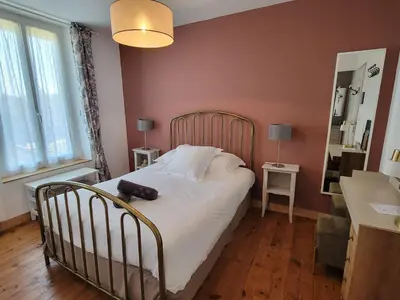 Un ou plusieurs lits dans un hébergement de l'établissement La Sucrerie - chambres à la campagne