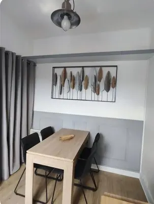Coin salon dans l'établissement Appartement centre ville Amiens