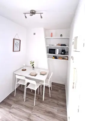 Cuisine ou kitchenette dans l'établissement Le Saint Marc
