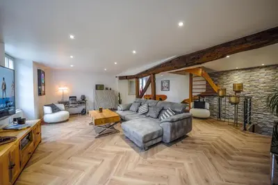 Coin salon dans l'établissement Charming House in the Heart of Senlis Design & Comfort