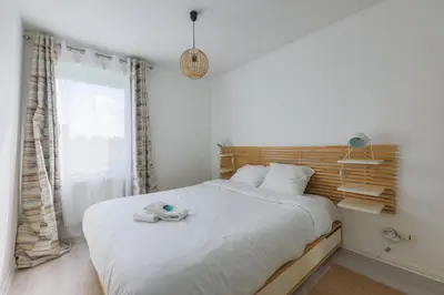 Un ou plusieurs lits dans un hébergement de l'établissement Family Elegance - Comfort & Garden