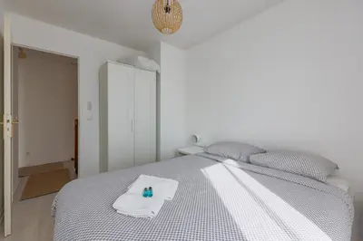 Un ou plusieurs lits dans un hébergement de l'établissement Family Elegance - Comfort & Garden