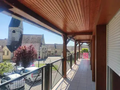 Balcon ou terrasse dans l'établissement Gîte 6 chambres du Moulin de Fourges privatisable - 19 personnes
