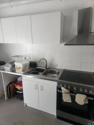 Cuisine ou kitchenette dans l'établissement Appartement partagé