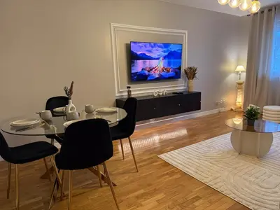 Télévision ou salle de divertissement dans l'établissement Cosy and Chic Appartement moderne proche gare