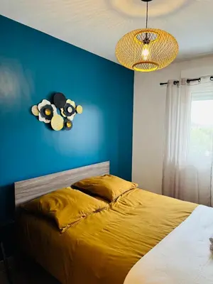 Un ou plusieurs lits dans un hébergement de l'établissement Cosy and Chic Appartement moderne proche gare