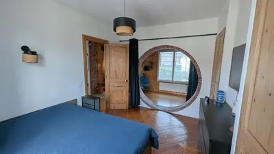 Un ou plusieurs lits dans un hébergement de l'établissement Maison au Jardin des Plantes