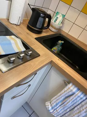 Cuisine ou kitchenette dans l'établissement Studio miroir-arrivée autonome-animal ok