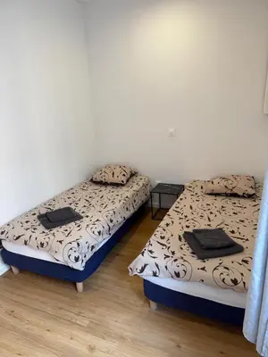 Un ou plusieurs lits dans un hébergement de l'établissement Appartement Magnifique
