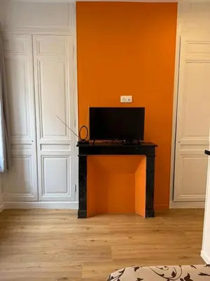 Télévision ou salle de divertissement dans l'établissement Appartement Magnifique