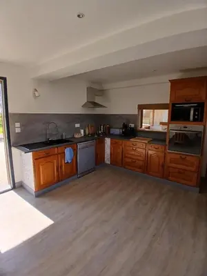 Cuisine ou kitchenette dans l'établissement La Rose des Vents