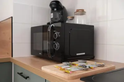Cuisine ou kitchenette dans l'établissement Lumineux T3 - 2 chambres, balcon - proche de Rouen
