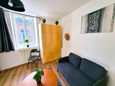 Coin salon dans l'établissement Le calme à deux pas de tout