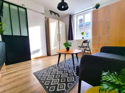 Coin salon dans l'établissement Le calme à deux pas de tout