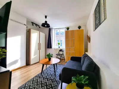 Coin salon dans l'établissement Le calme à deux pas de tout
