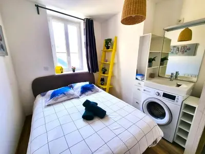 Un ou plusieurs lits dans un hébergement de l'établissement Le calme à deux pas de tout