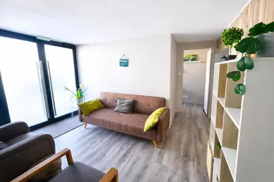 Coin salon dans l'établissement Spacieux de 150 m idéal familles et groupes