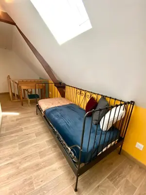 Un ou plusieurs lits dans un hébergement de l'établissement La maison des Hortillonnages, le calme dans Amiens