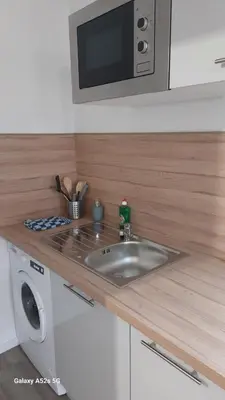 Cuisine ou kitchenette dans l'établissement Studio 5 moderne avec WiFi et stationnement