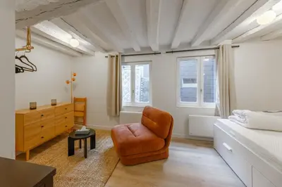 Un ou plusieurs lits dans un hébergement de l'établissement Studio centre historique - Le Beauvoisin - WiFi