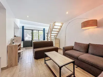 Coin salon dans l'établissement Maisonnette 49m2 à 5 minutes de chantilly
