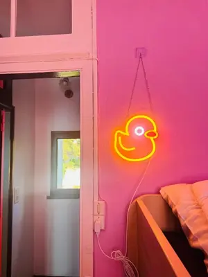 Un ou plusieurs lits dans un hébergement de l'établissement maison au charme rétro, équipée et tranquille