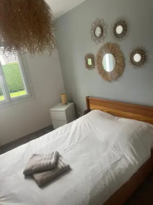 Un ou plusieurs lits dans un hébergement de l'établissement Maison 3 chambres a 5 min de la mer
