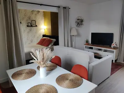 Télévision ou salle de divertissement dans l'établissement Studio Cosy