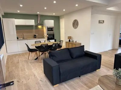 Cuisine ou kitchenette dans l'établissement Family Apparts Criel 1