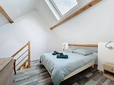 Un ou plusieurs lits dans un hébergement de l'établissement Maisonnette 36m2 à 5 minutes de Chantilly