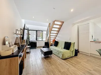 Coin salon dans l'établissement Maisonnette 36m2 à 5 minutes de Chantilly