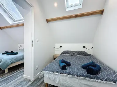 Un ou plusieurs lits dans un hébergement de l'établissement Maisonnette 36m2 à 5 minutes de Chantilly
