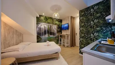 Un ou plusieurs lits dans un hébergement de l'établissement Studio pratique et cosy Rouen centre