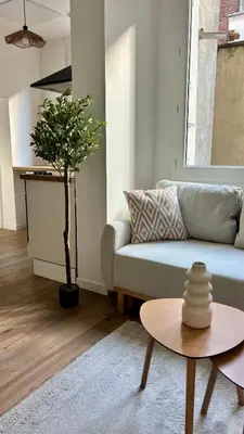Coin salon dans l'établissement Le Rive Droite - T2 hypercentre de Rouen